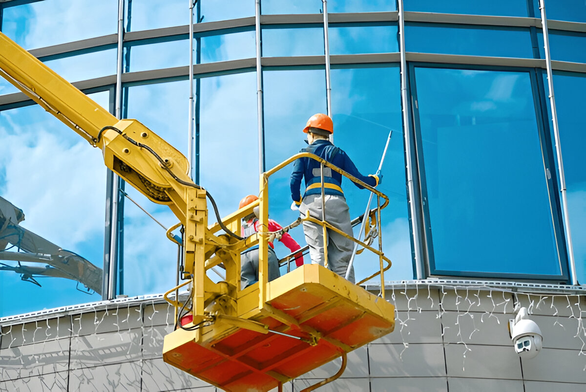Commercial building facade being professionally steam cleaned