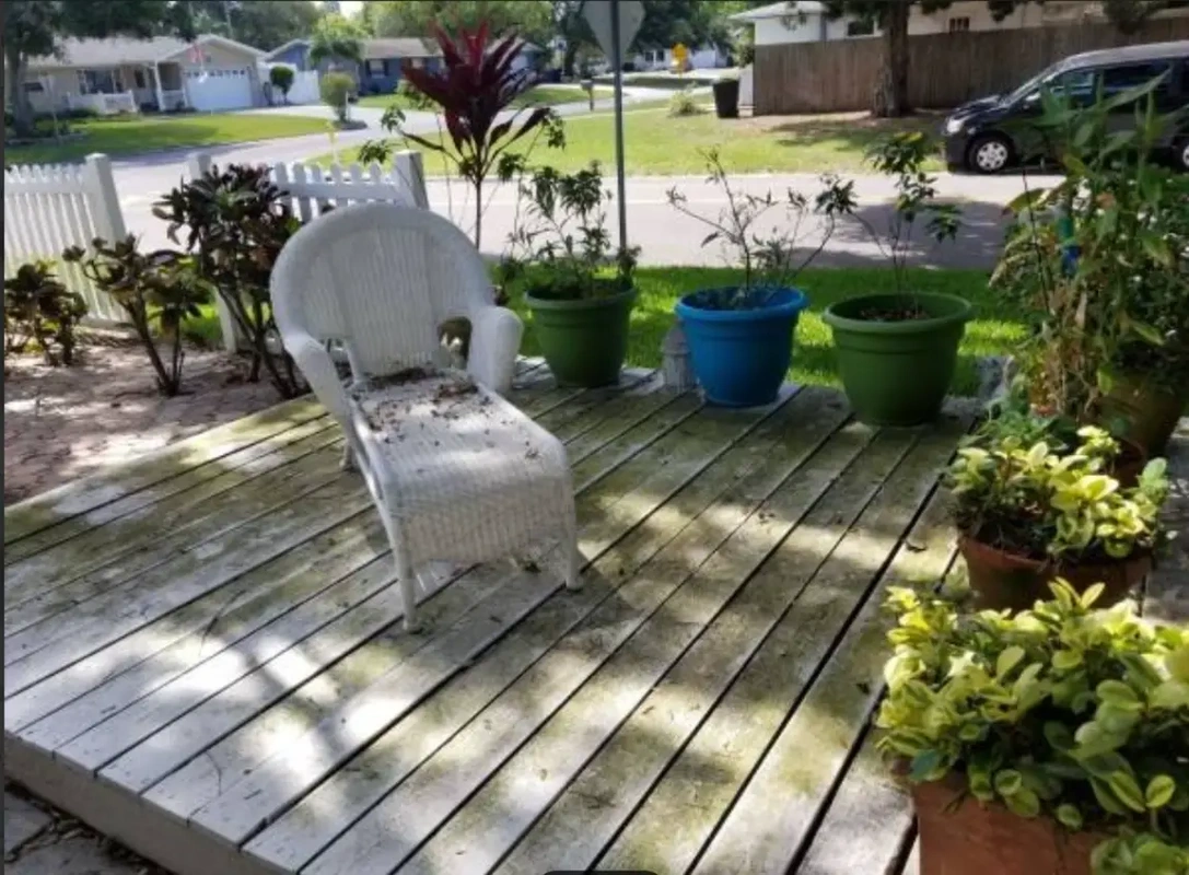 Outdoor terrace being professionally pressure washed to a spotless finish